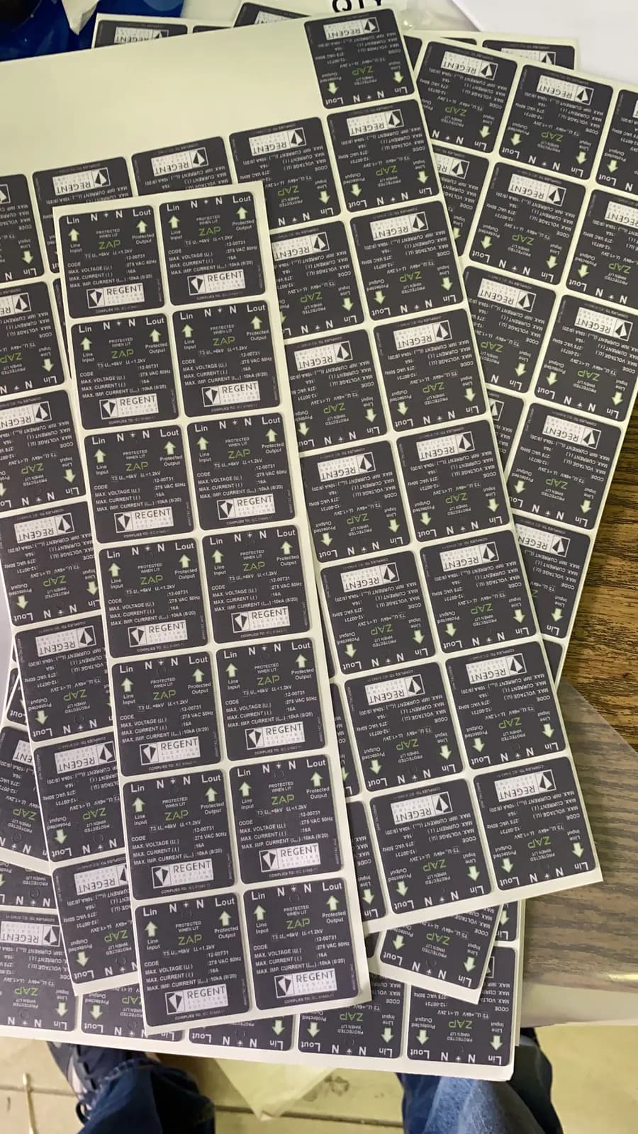 Labels in production on dark background